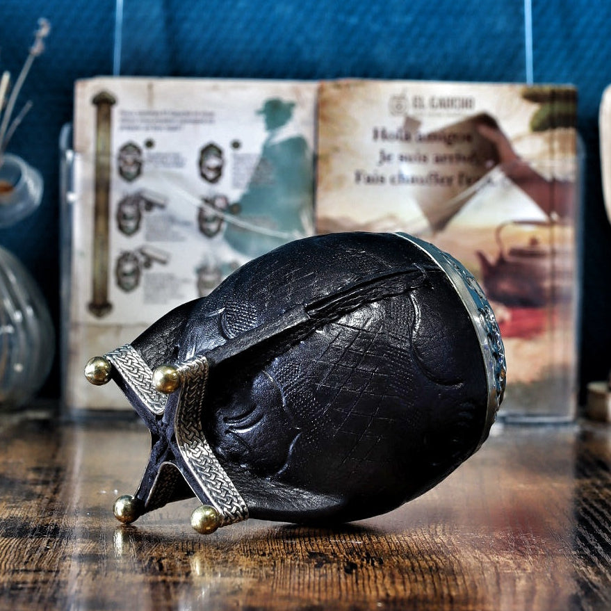 Gros plan sur les billes de bronze à la base du maté torpedo noir.