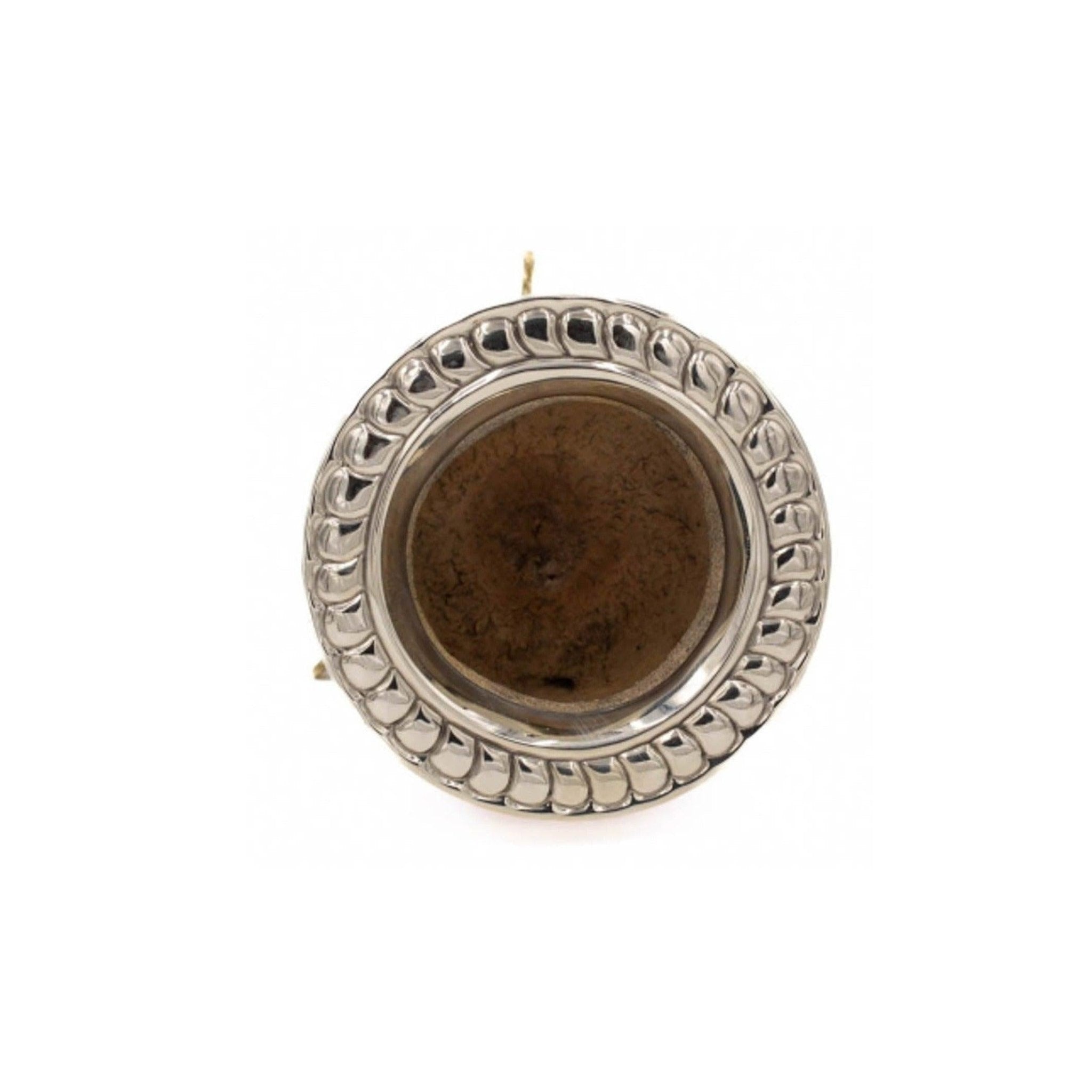 Dessus : ouverture bois, bordure ciselée.